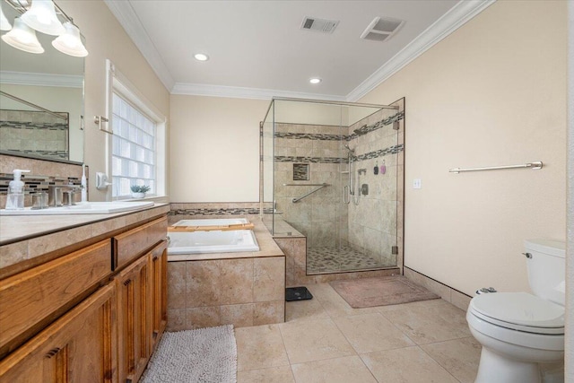 full bathroom featuring toilet, vanity, crown molding, and tile patterned flooring