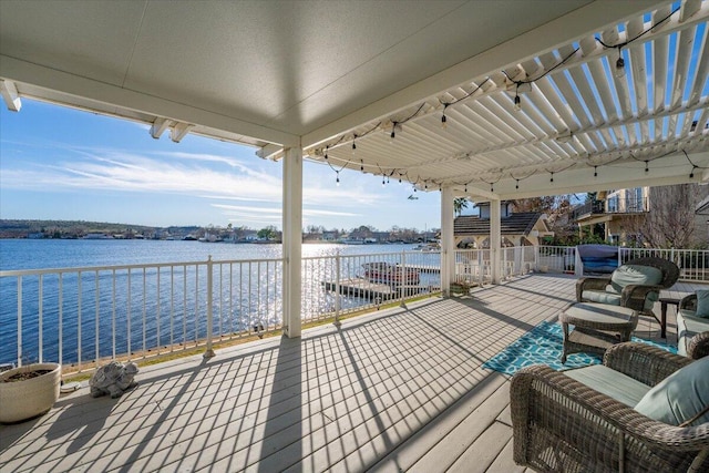 wooden terrace with a water view