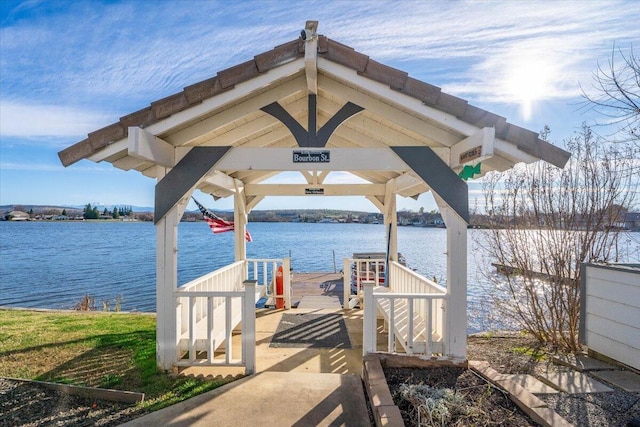 dock area with a water view and a gazebo