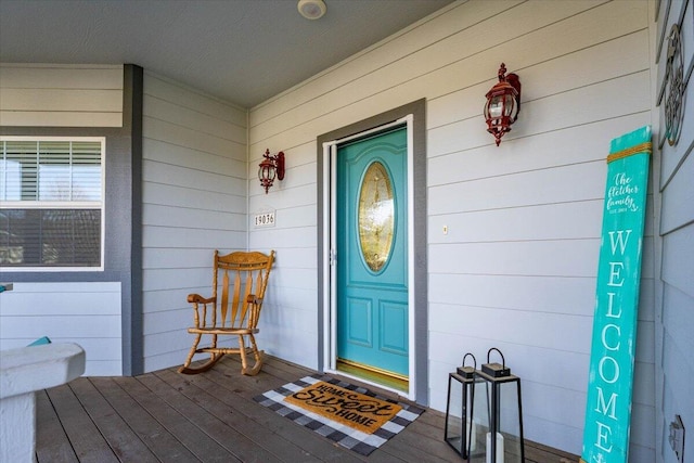 property entrance featuring covered porch