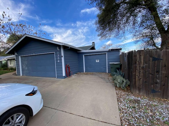 ranch-style home with a garage