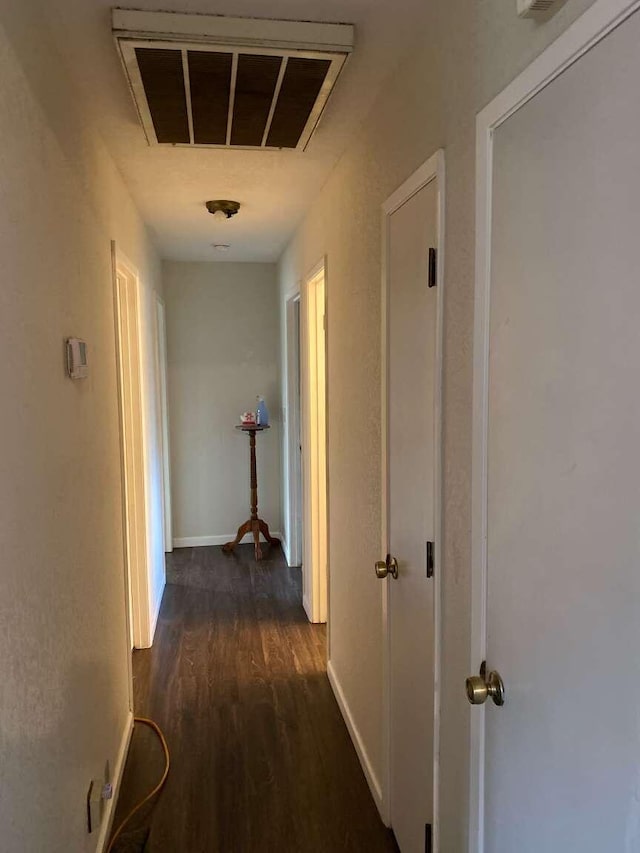 hall featuring dark hardwood / wood-style flooring