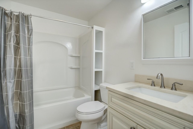 full bathroom featuring tile patterned flooring, vanity, toilet, and shower / tub combo