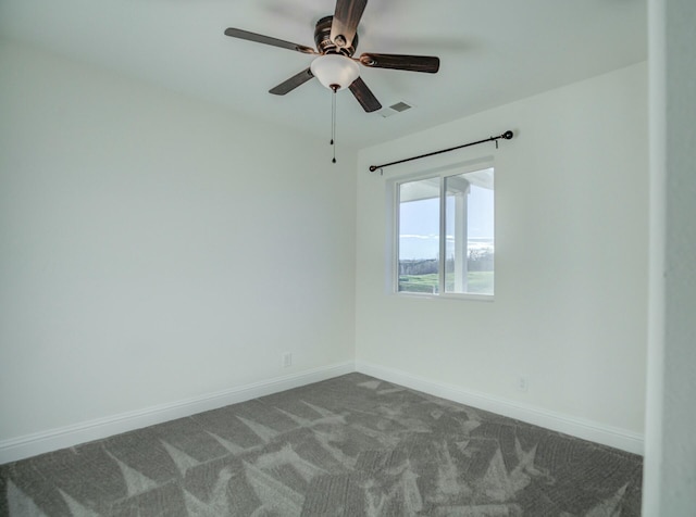 carpeted empty room with ceiling fan