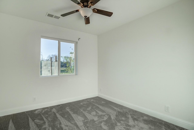 unfurnished room with ceiling fan and carpet floors