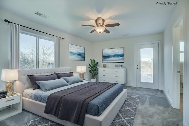 carpeted bedroom with ceiling fan