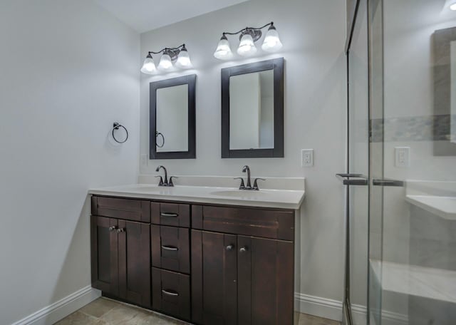 bathroom with vanity and walk in shower