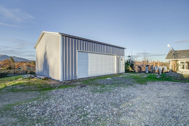 garage featuring a mountain view