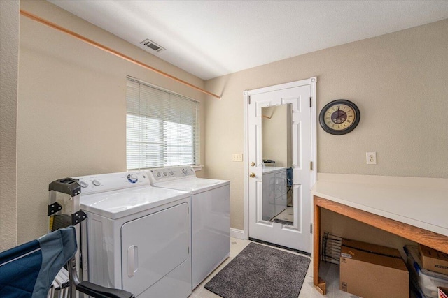 laundry area featuring washer and clothes dryer