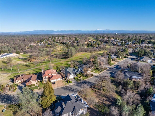 birds eye view of property featuring a mountain view