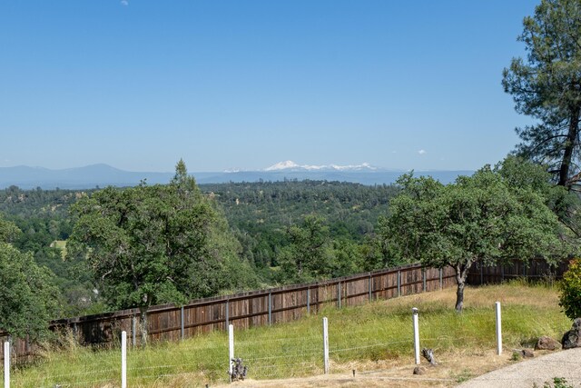 view of mountain feature featuring a rural view