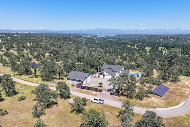 drone / aerial view featuring a mountain view