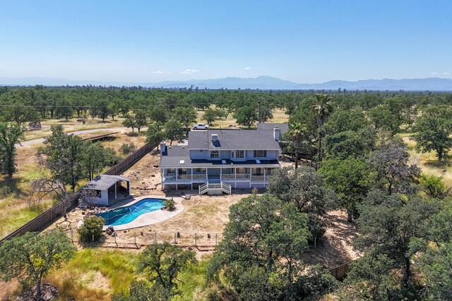 drone / aerial view featuring a mountain view