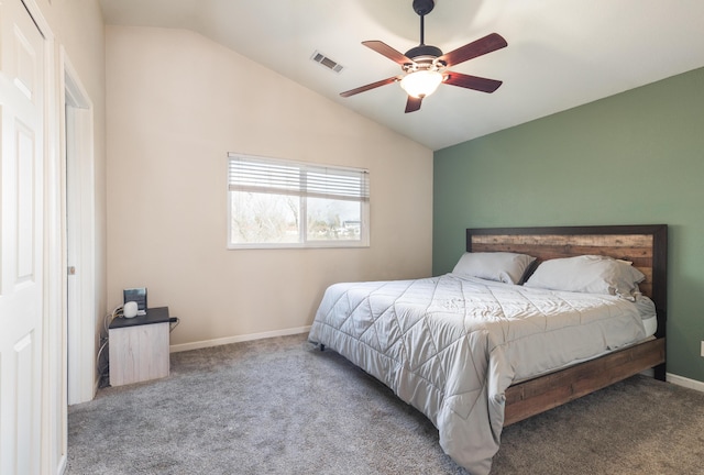 carpeted bedroom with ceiling fan and lofted ceiling