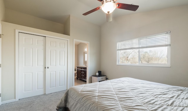 carpeted bedroom with ceiling fan, connected bathroom, and a closet