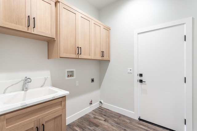 laundry area featuring hookup for a gas dryer, sink, hookup for a washing machine, electric dryer hookup, and cabinets