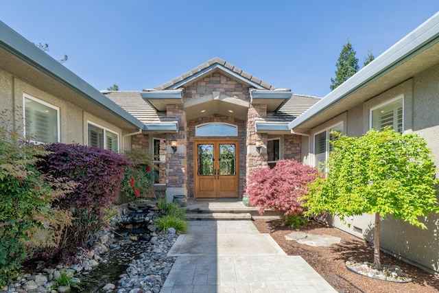 property entrance with french doors