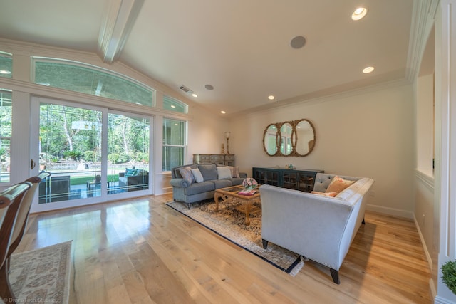 living room featuring vaulted ceiling with beams and light hardwood / wood-style flooring