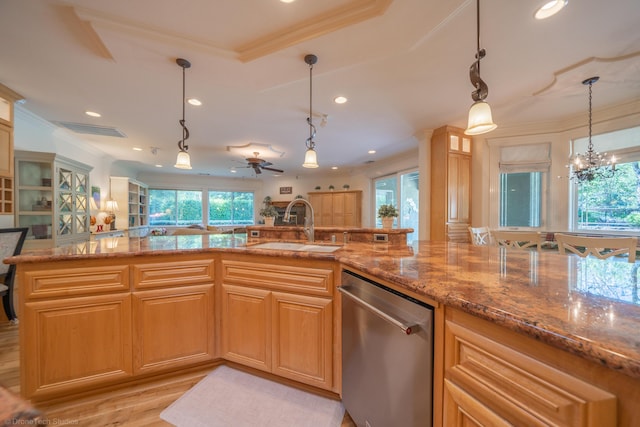 kitchen with sink, stainless steel dishwasher, light hardwood / wood-style floors, decorative light fixtures, and ceiling fan with notable chandelier