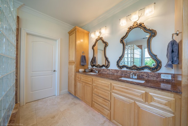 bathroom with vanity, tile patterned floors, and crown molding