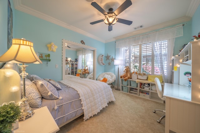 bedroom with ceiling fan, crown molding, and light carpet