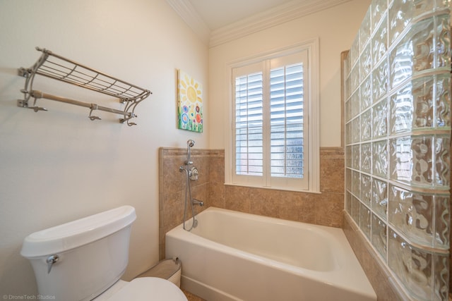 bathroom with crown molding, toilet, and a tub