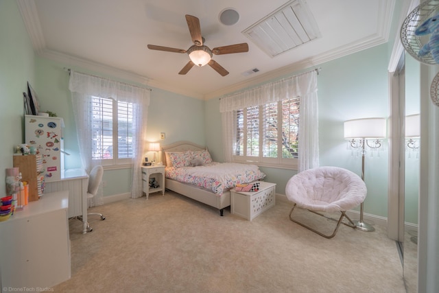 bedroom with light colored carpet, ceiling fan, and ornamental molding