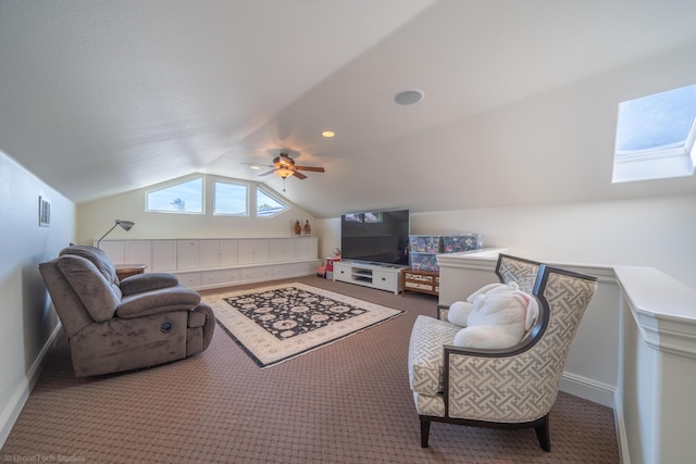 living room with carpet flooring, ceiling fan, and lofted ceiling