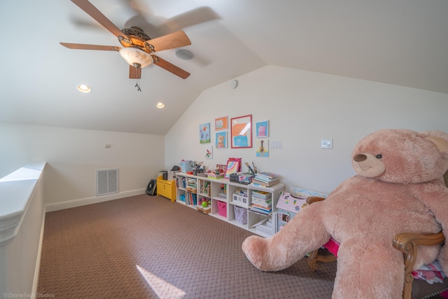 recreation room with ceiling fan, lofted ceiling, and carpet floors