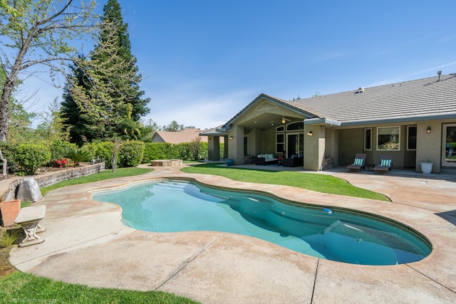 view of swimming pool featuring outdoor lounge area and a patio area