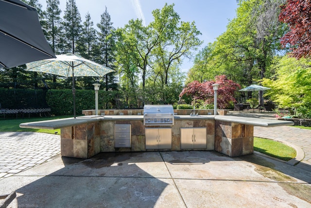 view of patio with area for grilling