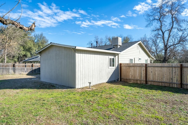 view of property exterior featuring a yard and central air condition unit