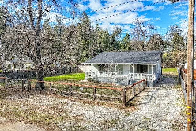 back of house with covered porch