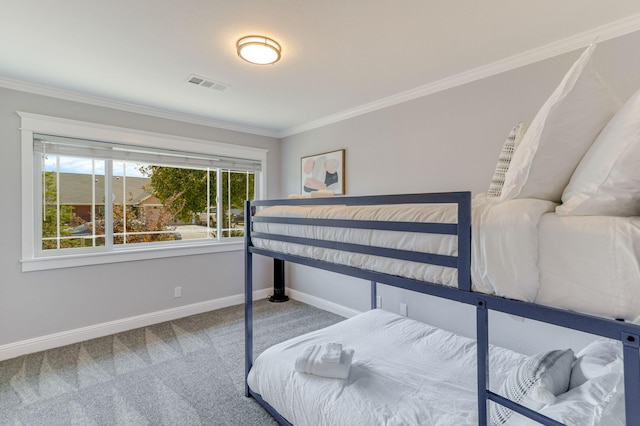 bedroom featuring carpet flooring and ornamental molding