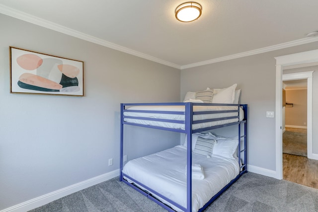 unfurnished bedroom featuring carpet and crown molding