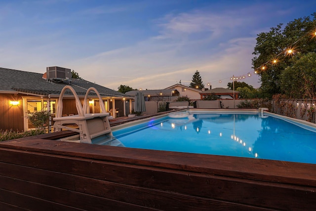 pool at dusk with central AC