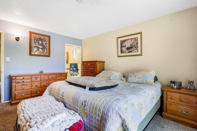 carpeted bedroom with a textured ceiling