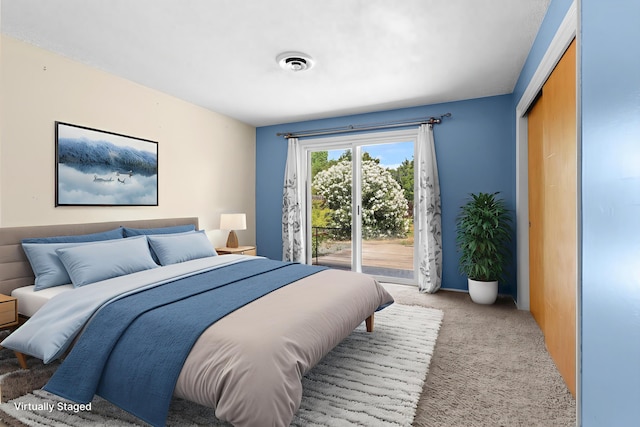 2048 Wilder Dr, Redding, CA 96001 - bedroom with light colored carpet and access to outside