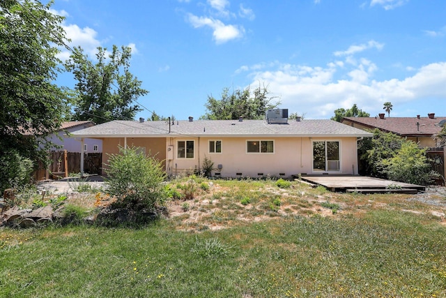 2048 Wilder Dr, Redding, CA 96001 - back of property with stucco siding and a wooden deck