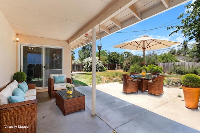 2048 Wilder Dr, Redding, CA 96001 - fenced backyard with an outdoor hangout area, a patio, and outdoor dining area