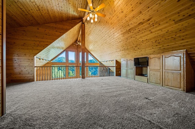 additional living space with carpet, wood walls, high vaulted ceiling, ceiling fan, and wood ceiling