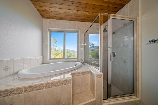 bathroom featuring lofted ceiling, wooden ceiling, and shower with separate bathtub