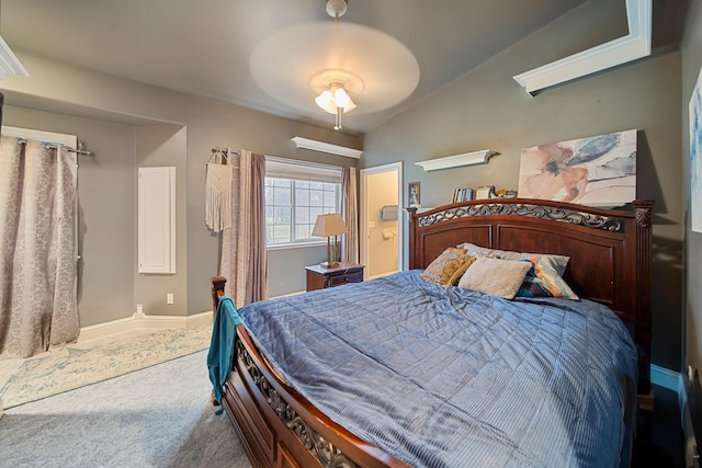 carpeted bedroom with vaulted ceiling