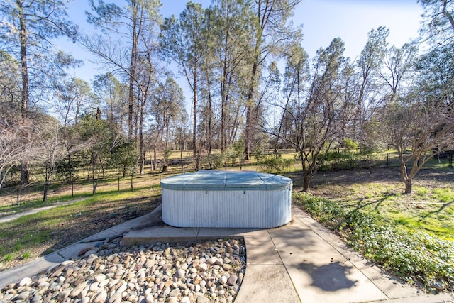 view of patio with a hot tub