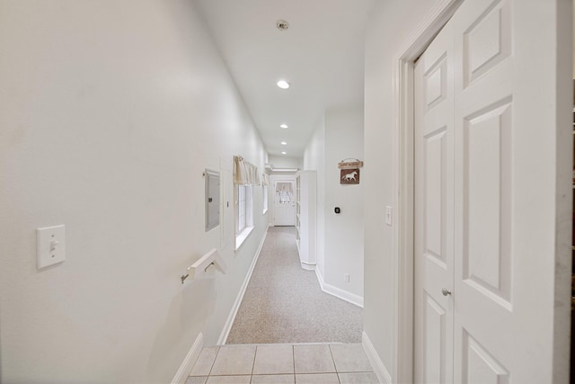 hallway with light tile patterned floors