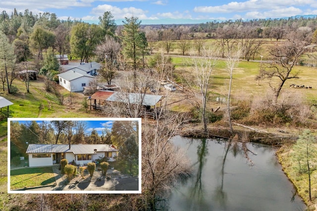 aerial view featuring a water view