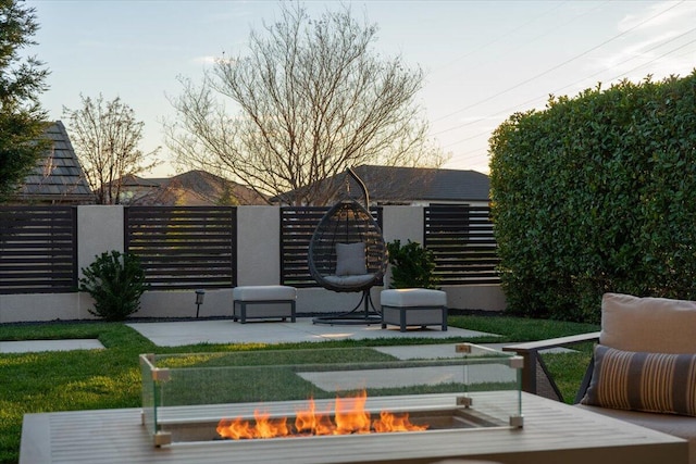 deck at dusk with a patio