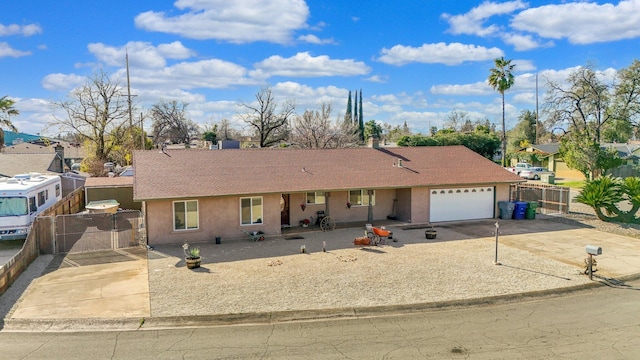 single story home featuring a garage