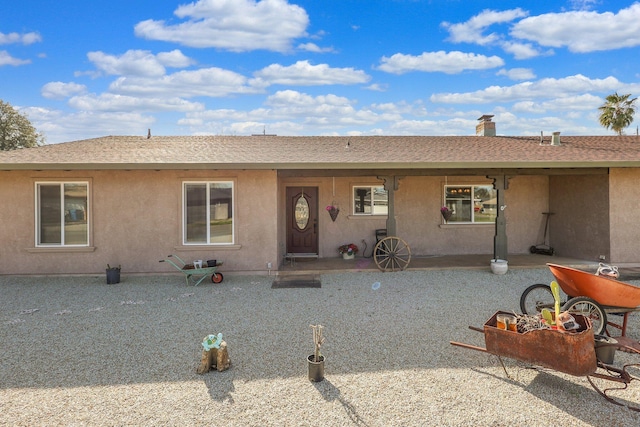 ranch-style house featuring a patio area