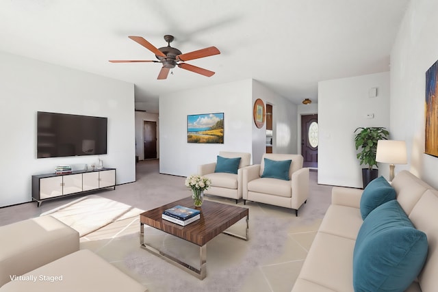 carpeted living room featuring ceiling fan